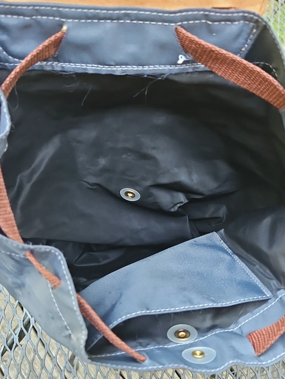 Longchamp navy nylon backpack with brown leather flap